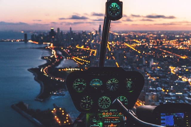 View from Helicopter at Dusk - Photo by Austin Neill on Unsplash